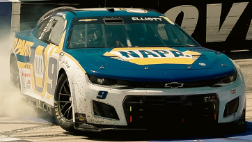 A racing car with the NAPA logo prominently displayed on the hood
