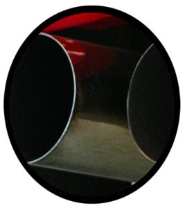 The tailpipes of an automobile muffler