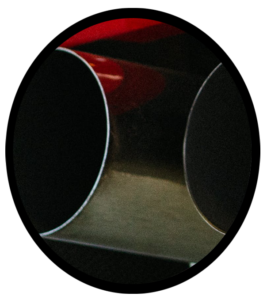 A pair of automobile exhaust muffler tail pipes