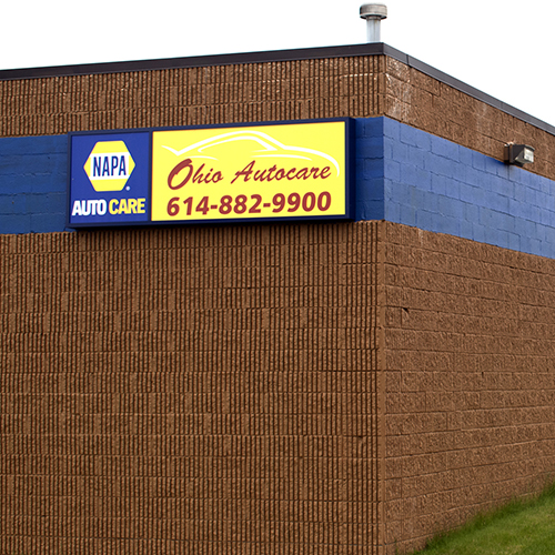 The outside sign of an automobile repair shop