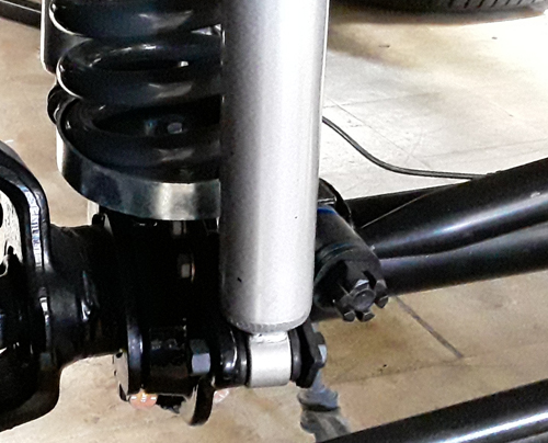 The shocks and springs of an automobile suspension system