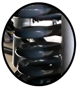 A newly installed auto coil suspension spring