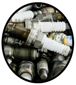 A large group of old automobile spark plugs