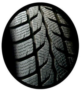 A close up view of a car tires tread