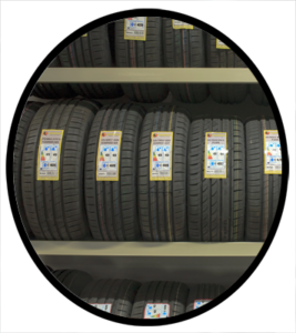 A retail rack of new all-weather tires