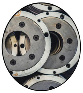 A stack of new automotive brake rotors