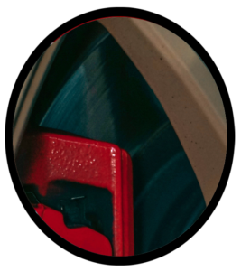 Close up image of an exotic foreign car brake pad and rotor