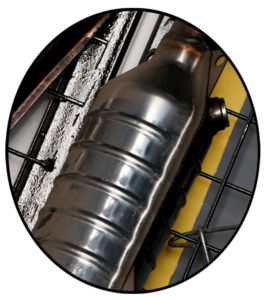 A new automotive resonator hanging on a wall rack