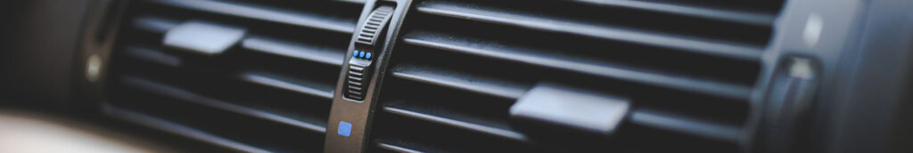 The heater and air conditioning vents of an automobile
